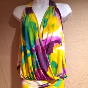 Flowered halter top. Worn once, Perfect for summer getaways.         Size sm/med